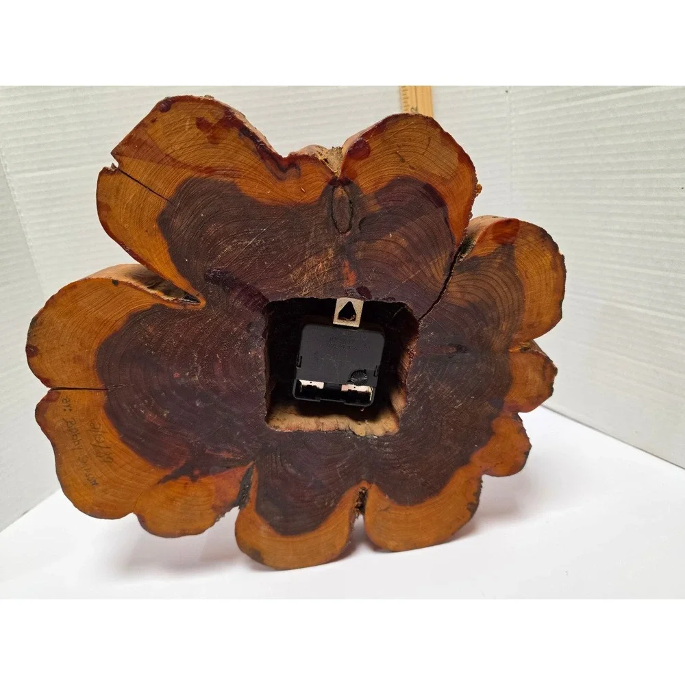 vintage live-edge wall clock is crafted from a natural wood tree slice,